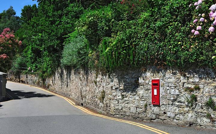 Post box set in stone wall